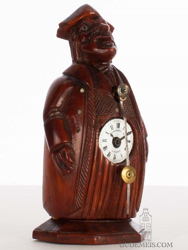 A miniature French sculptural zappler table clock, Neuburger & Cie, circa 1850